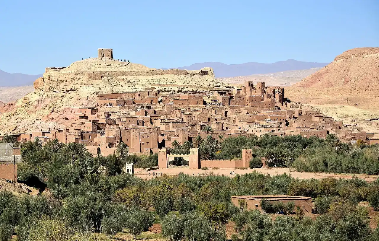 Kasbah of Aït Ben Haddou under a desert sky on the Amoudo Journeys 12-day Morocco grand tour
